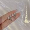 Star bow, zircon ear clips, female niche design, fashionable earrings, temperament, versatile, no ear piercings, mosquito coil disc, ear clips.