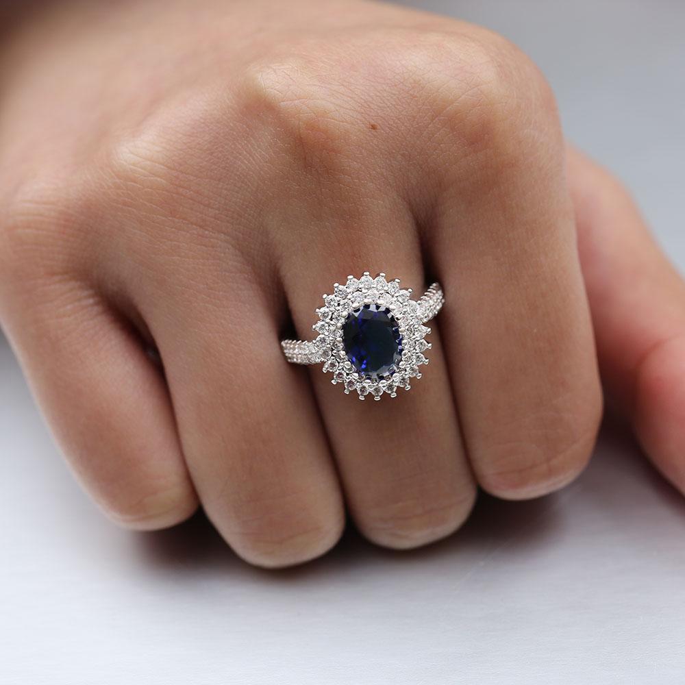 Bague d'anniversaire de mariage Huitan avec Zircone cubique bleu taille ovale Bijou de luxe Cadeau de Saint-Valentin Bagues de mode pour femmes