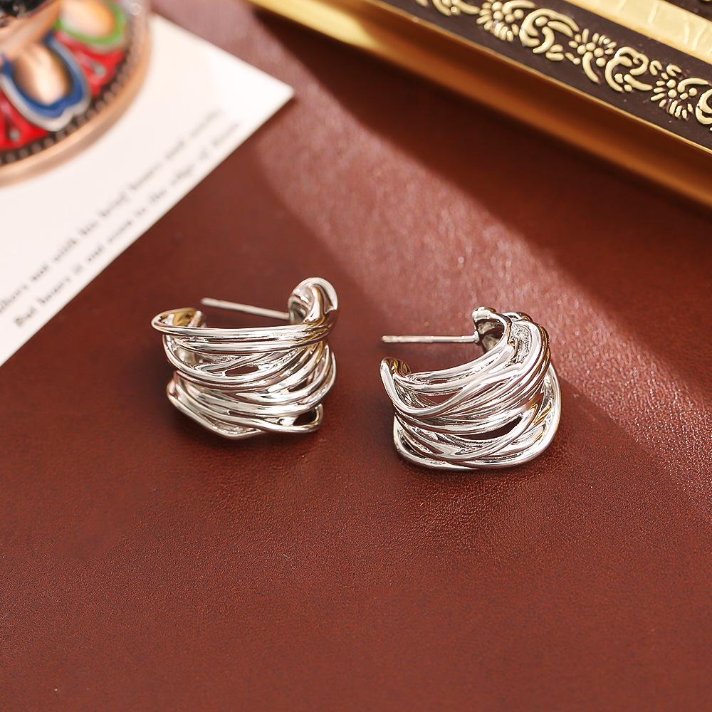 Trendy European & American Cross-Circle Earrings: High-End, Multi-Layer, Minimalist Fashion Jewelry.