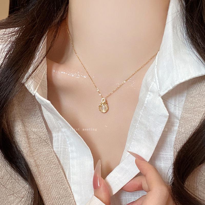 "Elegant Korean Titanium Steel Zircon Bow Necklace for Women"