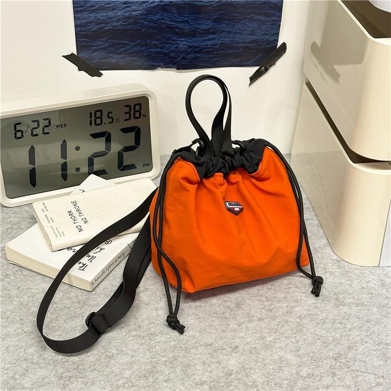 Japanese casual oblique span bag 2025 new Korean version fashionable versatile commuter sports small bag tooling shoulder bucket bag