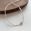 heart-shaped broken silver pearl necklace