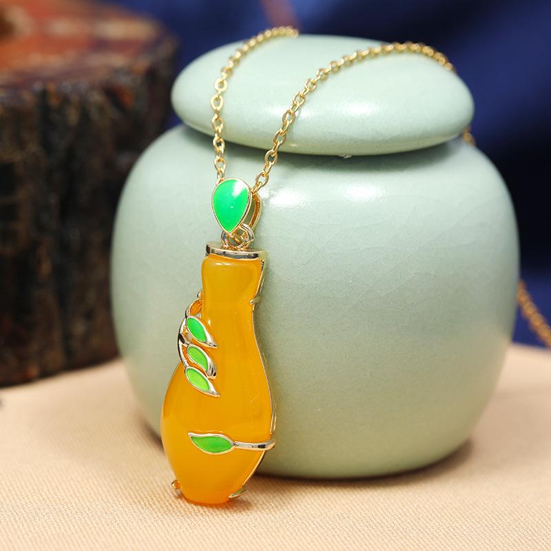 Chinese style imitation Hetian jade safety buckle necklace women's retro temperament titanium steel clavicle chain gold inlaid jade pendant with