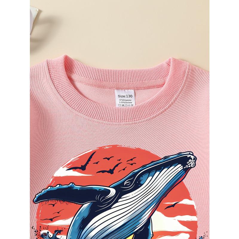 Felpa alla moda con una balena che salta contro un tramonto con onde dell'oceano e uccelli, perfetta per le ragazze