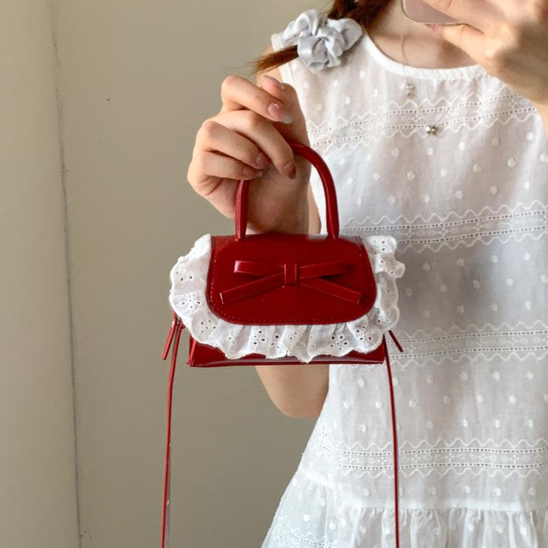 Korean version of sweet bow shoulder bag women's 2025 summer fashion lace mini portable messenger bag