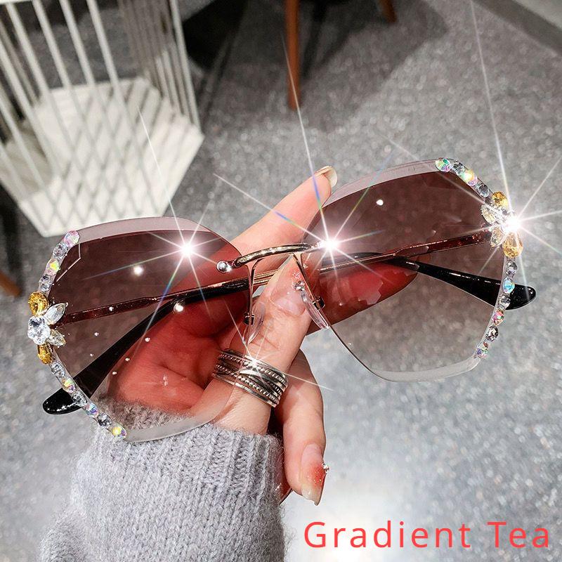 Ochelari de soare anti-UV fără ramă pentru femei, cu incrustații de diamante