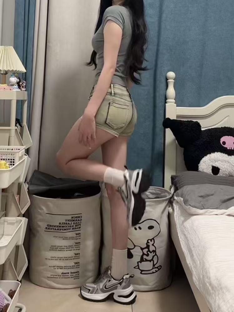 Women's Retro Low-Waist Distressed Denim Shorts - Slimming A-Line Hip-Hugging Hot Pants for Summer.