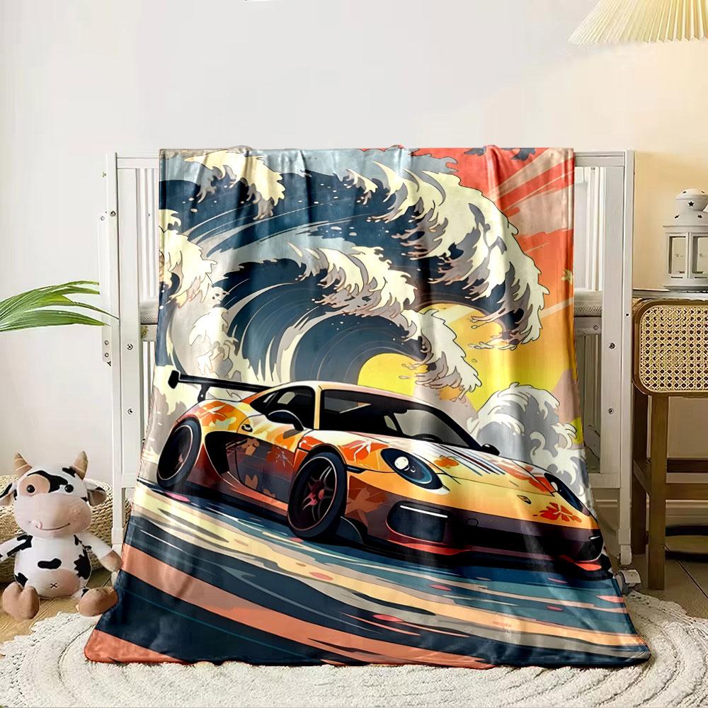 A vivid car with fiery designs in front of stylized, crashing ocean waves. for all seasons blanket lunch break throw gift 80cm x 120cm