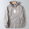 Foreign Trade Export Laser Perforated Breathable Summer New Lightweight Uv Protection Men's Sports Hooded Sun Protection Skin Jacket