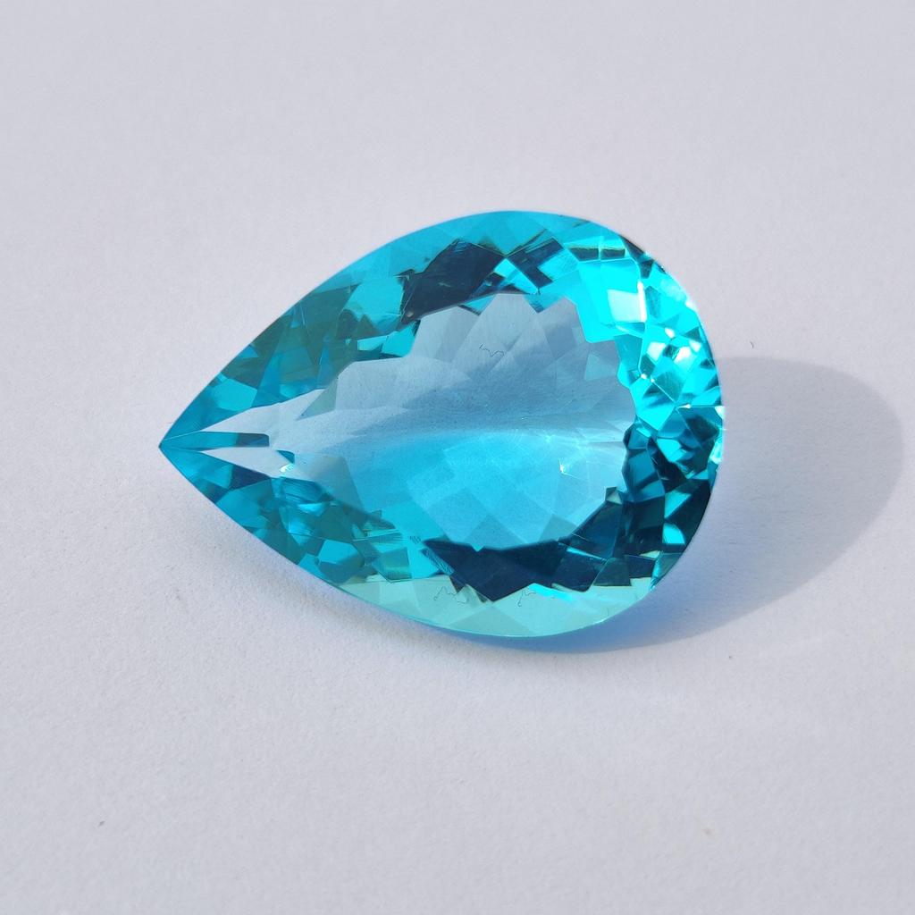 Pear Cut Sky Blue Topaz Shade Glass Stone, 21.95 Carat, 24x18x10 MM Size Pear Shape Stone.