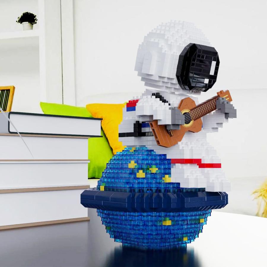 Non-Toxic 1423Pcs Guitar Astronaut Model Micro Building Blocks Luminous Spaceman Desktop Ornament For Kids Toys Gift Set