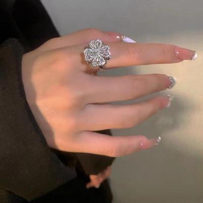 Rotatable Zircon Flower Ring: Light Luxury Minimalist Style for Women's Stress Relief