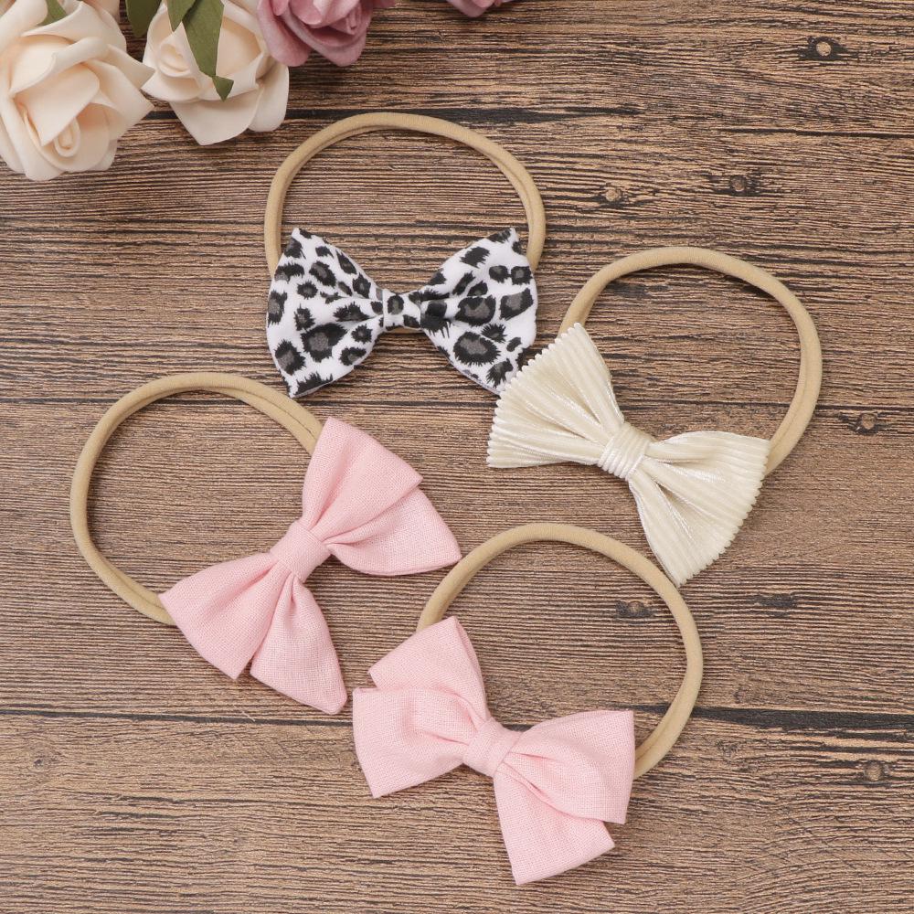 Baby-Stirnband-Set aus Nylon und Baumwolle: Stirnbänder mit Schleife und Leinen in Geschenkbox.