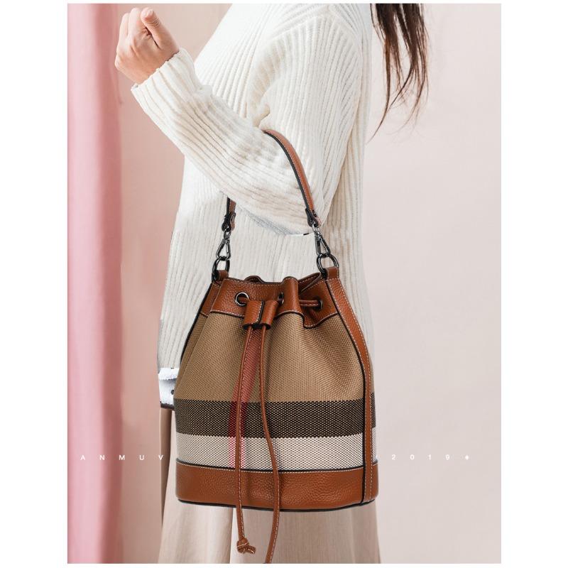 New Hand-held Crossbody Canvas Bucket Bag Drawstring Buckle Large Capacity High-end Niche Shoulder Bag for Women