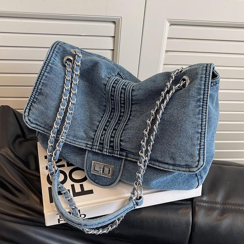 

Denim bag women s tote bag large capacity summer messenger 2025 new versatile chain class bag світло-синій колір