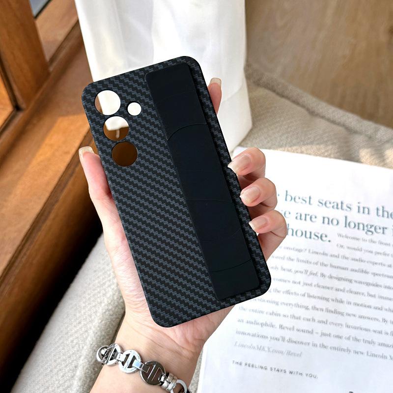 Suitable for Samsung S24ultra Elastic Wristband Mobile Phone Case S24 Carbon Fiber S25ultra Anti Fall S23 Protective Case