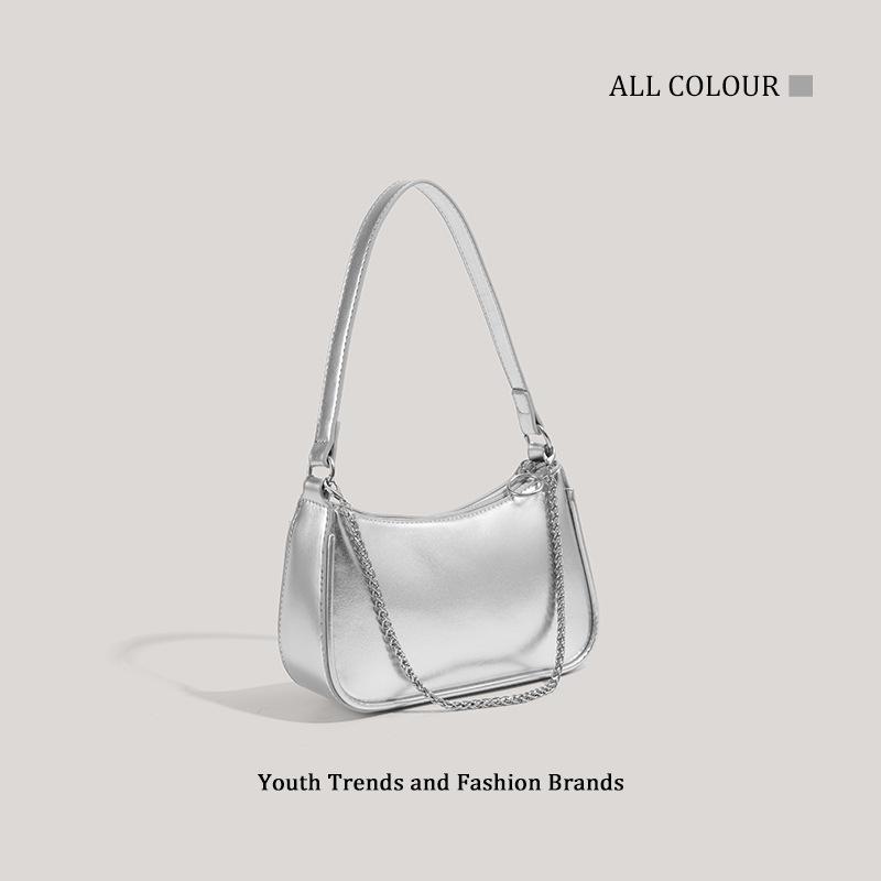 Niche design fashion sense silver bag women's new underarm handbag simple and versatile hand bag