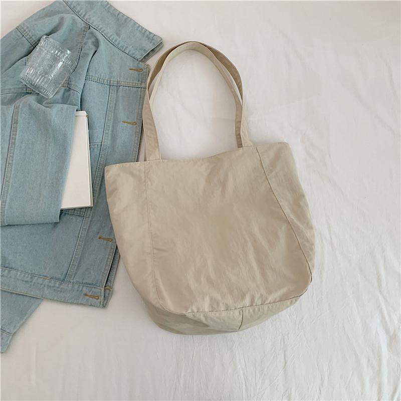 Wasserdichte Umhängetasche aus Nylon für Damen, einfarbig, große Kapazität, Pendler-Einkaufstasche