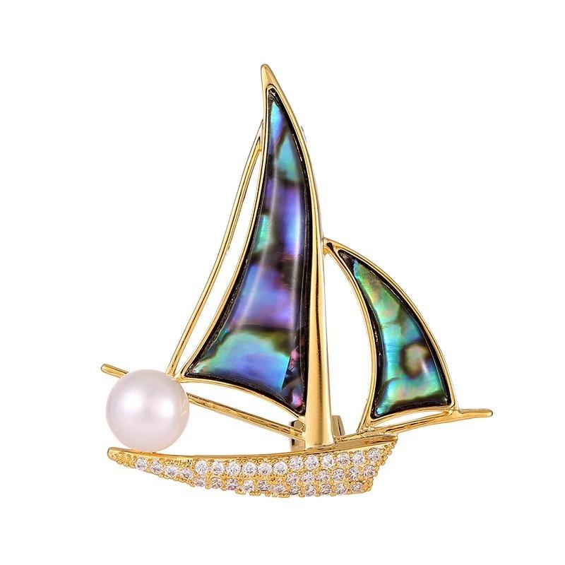 The "Smooth Sailing" Brooch Is A High-end Women's Design with A Unique and Exquisite Sailboat Corsage