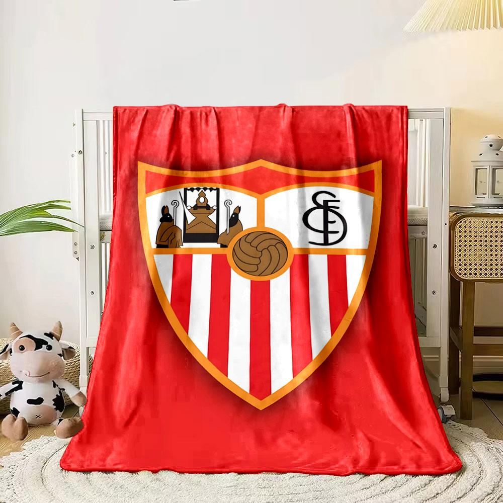 A shield with red and white stripes, icons, a football, and "SFC" initials. for all seasons blanket lunch break throw gift