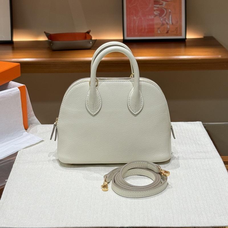 2026 new leather women's bag first layer cowhide method sheep pattern mini shell bag bowling ball portable oblique span women's bag