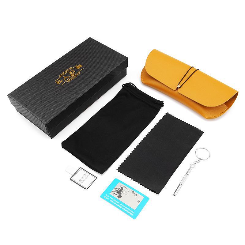 Luxury Leather Eyeglass Kit: Soft Case, Cleaning Cloth, Pouch, Screwdriver, Strap, and Buckle.