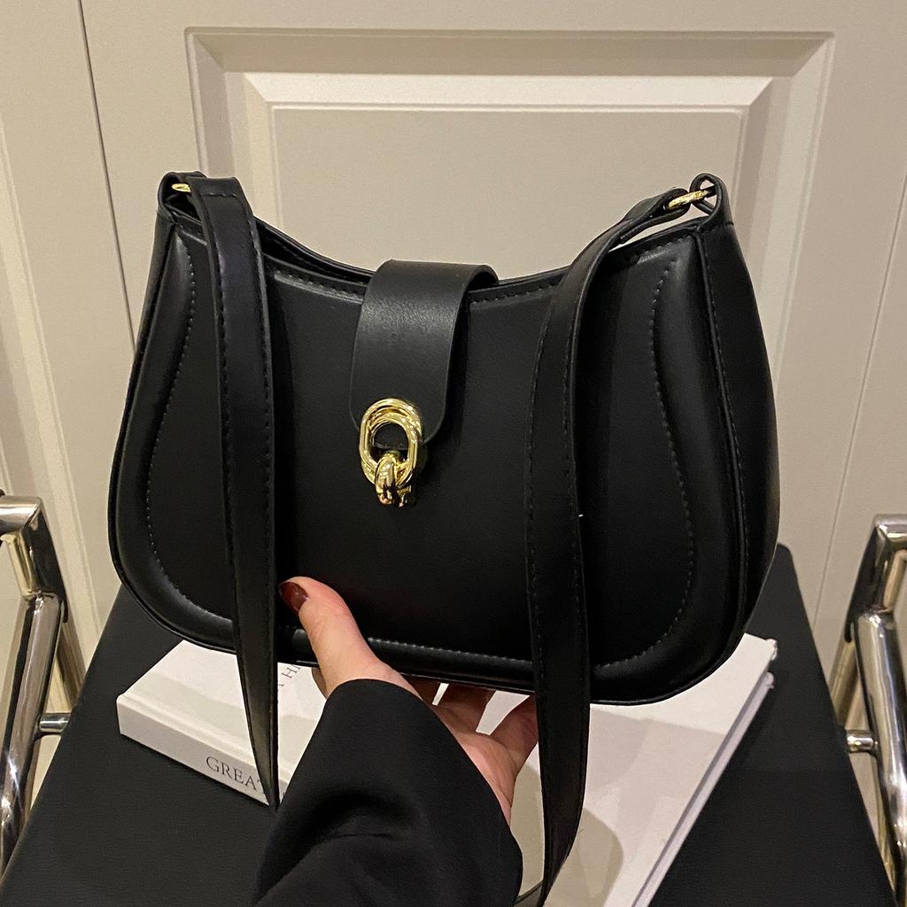 This year, the popular small bag women's 2025 new niche popular versatile portable small round bag texture foreign style messenger bag