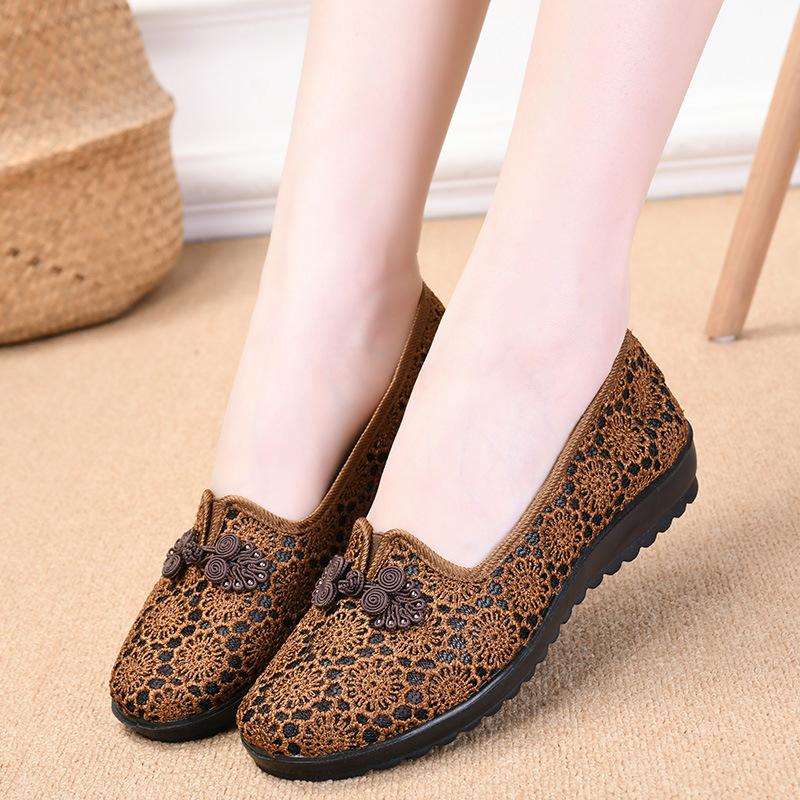 Summer new cloth shoes women's flying woven hollow breathable medium and old soft sole one pedal casual shoes