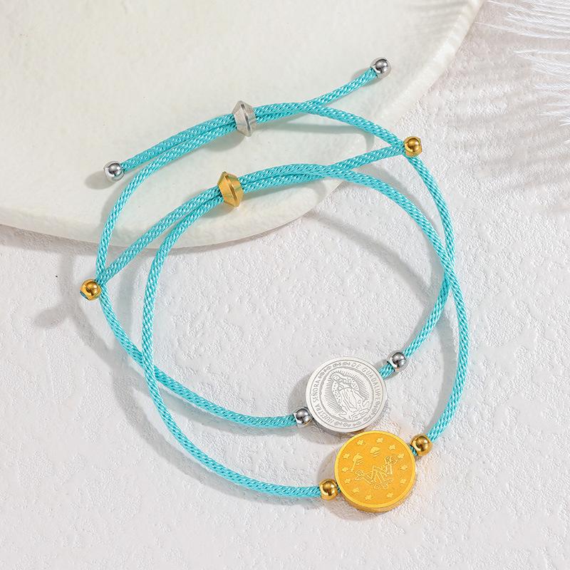 Minimalistisches blaues Seilarmband mit Herz-, Männchen- und runden Anhängern aus Edelstahl