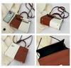 Color Block Kelly Bag: Trendy Two-Tone, Large Capacity, Versatile Shoulder & Crossbody Bag for Work Commute.