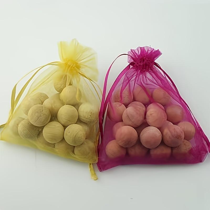 

40-Count Pack of Natural Camphor Balls—A Freshener and Deodorizer for Clothes and Home Interiors That Helps Prevent Mold in Wardrobes and Cabinets Natural camphor wood ball (random bag color)