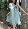 Vestido dulce abullonado francés para mujer, sin mangas de verano con lazo, delicado vestido de capullo de flor de princesa, falda midi con cuello de muñeca