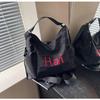 Bolso tote para mujer 2024 nuevo de gran capacidad para ir al trabajo con letras estilo extranjero estudiantes universitarios van a clase mochila de hombro