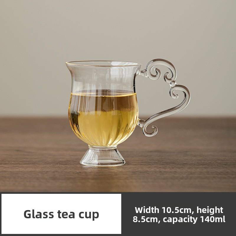 Vintage handgjord tekanna i glas, tekopp i högt borosilikatglas, rättvis kopp, redskap för eftermiddagste