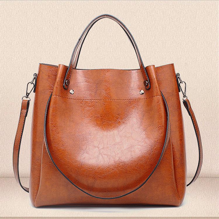 Genuine Leather Large Capacity Handbag for Oily Skin - Fashionable Crossbody and Shoulder Bucket Bag