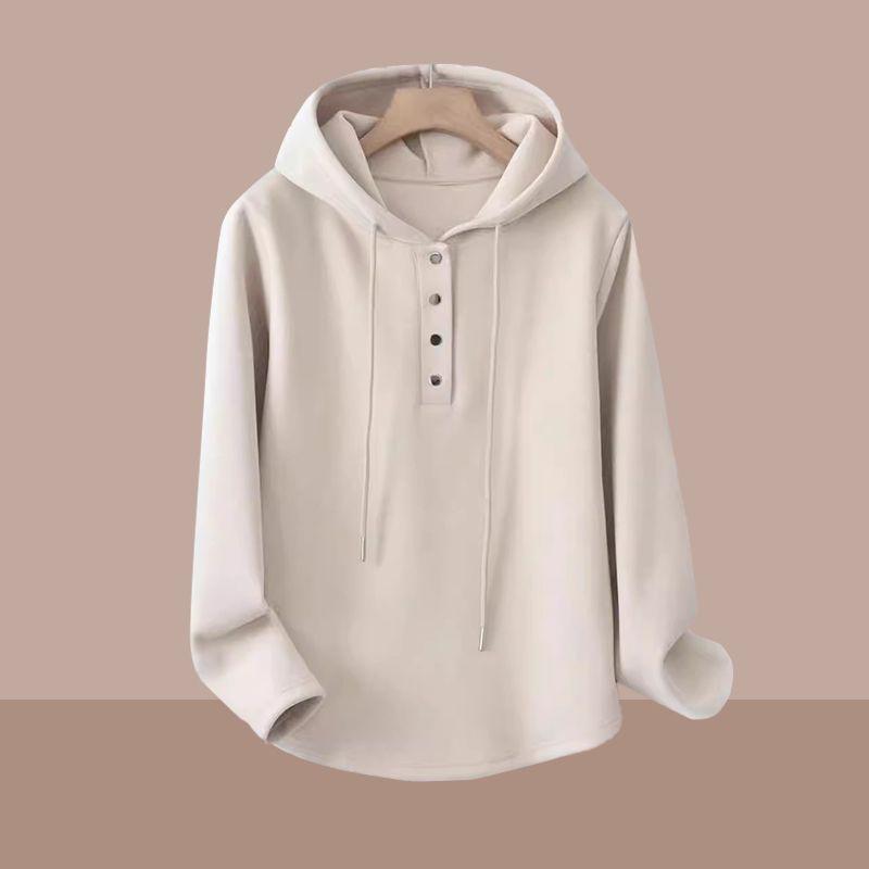 Suéter holgado y elegante con capucha para mujer para principios de primavera: estilo corto a la moda.
