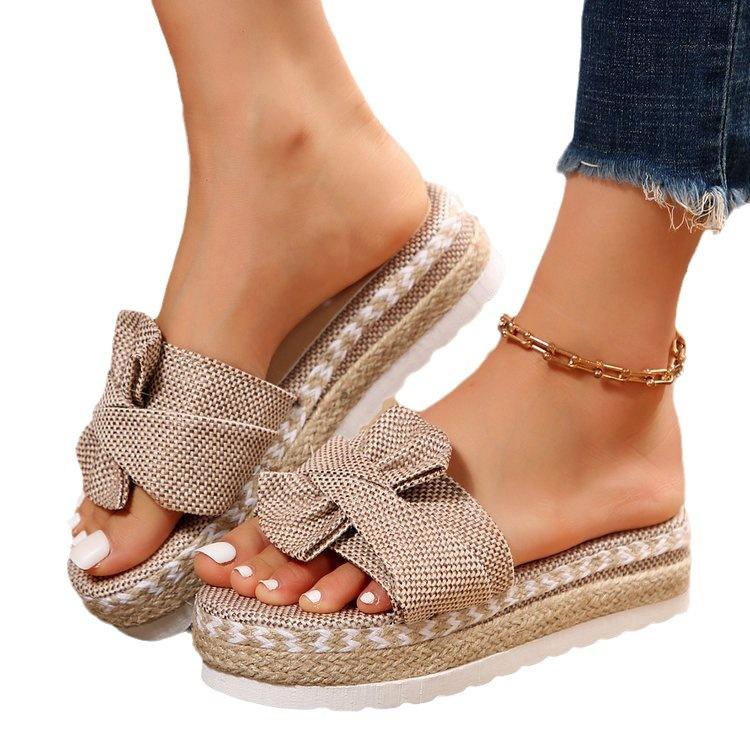 Außenhandel große Größe dicksohlige Hausschuhe Damen 2025 neue Schleife Stroh gewebt Absatz Absatz erhöhende Hausschuhe