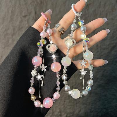 Accesorii pentru telefoane – Curele și brelocuri pentru telefoane