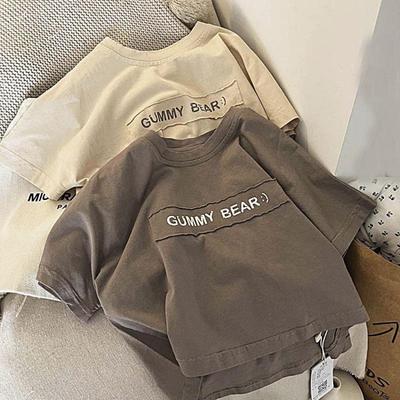 Camiseta de algodón con letras para niños, estilo coreano, de verano, unisex, holgada.