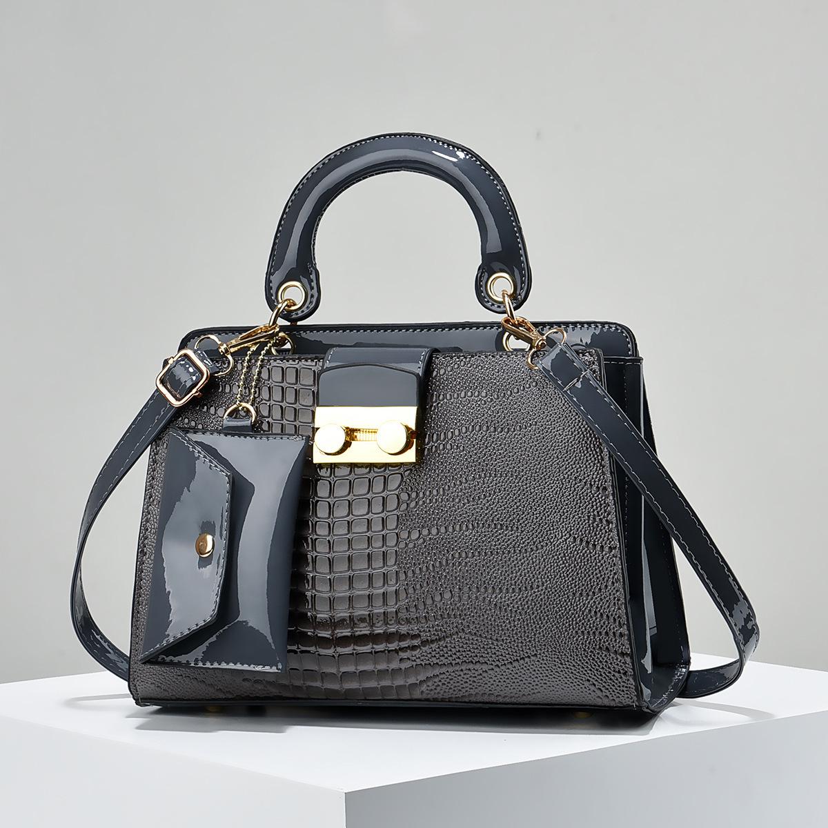 

2023 Женский набор из двух предметов: сумка на плечо и через плечо с узором под ящерицу - Европейская и американская мода 27x12x20 cm темно-синий