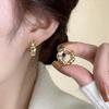 Twist Geometric Circle Earrings: Trendy Croissant Style for Women, Needle Back, Fashionable & Versatile Accessory