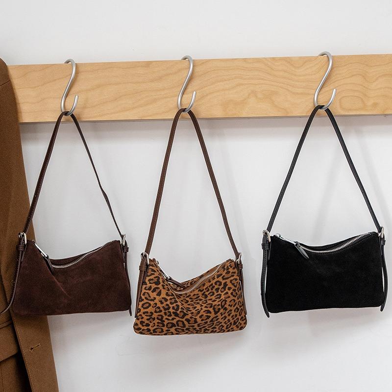 Hot autumn and winter new leopard print cowhide saddle bag women's genuine leather shoulder messenger bag commuter handbag women