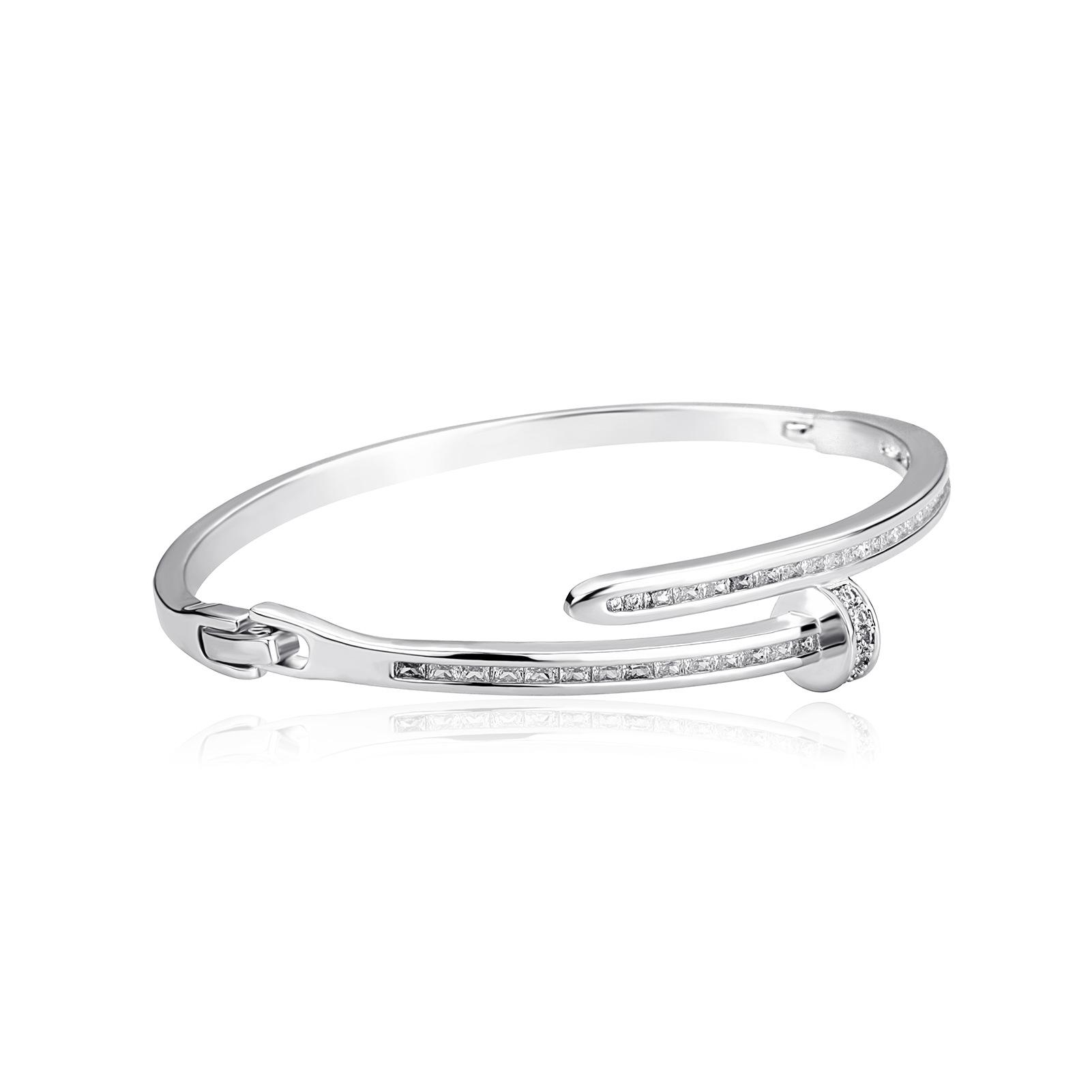 

Золотые серьги и браслеты в форме гвоздей с цирконами - Европейская и американская хип-хоп роскошная бижутерия, модный фаворит знаменитостей