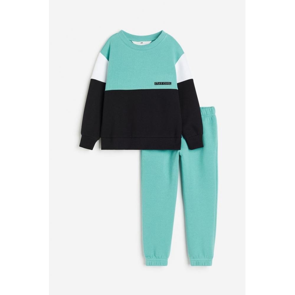 

Комплект из толстовки и брюк HM Бирюзового цвета