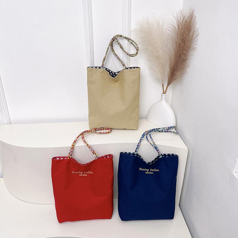 Large-capacity casual double-sided plaid canvas trendy contrasting colors summer new hand-held tote bag