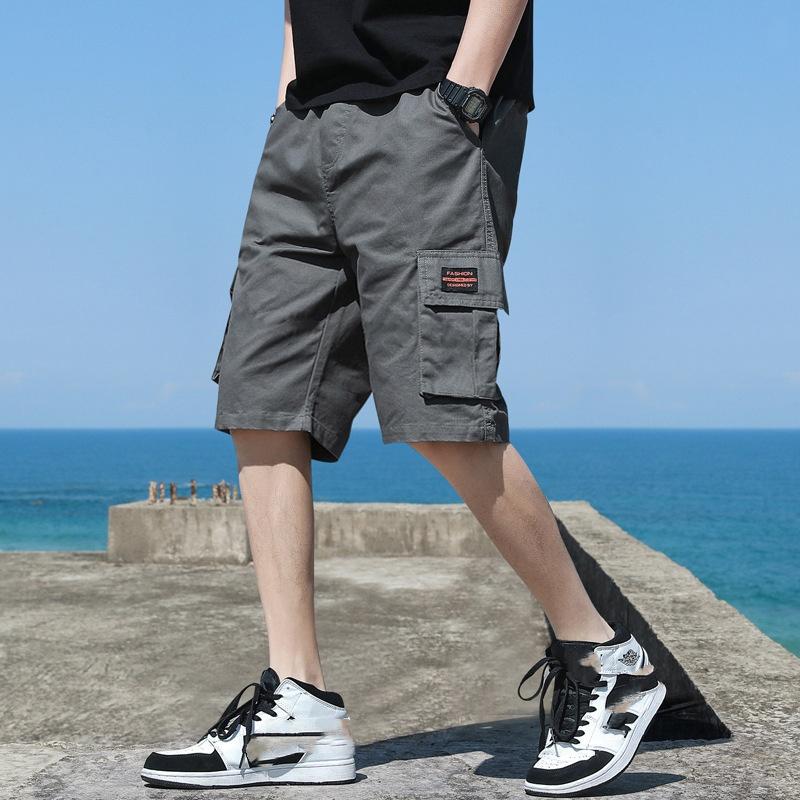 Pětibodové plážové oblečení, letní ležérní trend, univerzální volné strečové sportovní pětibodové kalhoty pro muže