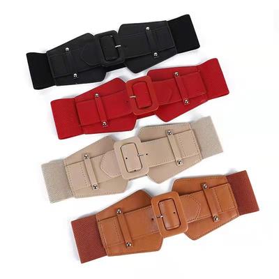 Elastic and Tight, Waist-cinching and Slimming. A Lady with A Waist Belt Paired with A Down Jacket and Sweater. A Retro Wide Waist Belt for Women