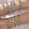 18K Gold-Plated Bracelet Set: Stainless Steel Heart, Flower & Zircon Details with Full Diamond Texture.