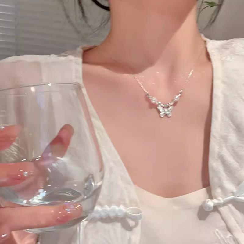 Baroque retro beaded pearl necklace ins wind love pendant sweater chain Yiwu accessories