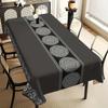 One rectangular tablecloth with a luxurious black and white floral print - made of durable polyester fabric.